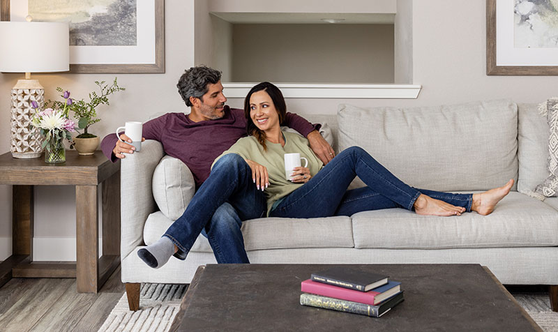 couple embracing on a couch